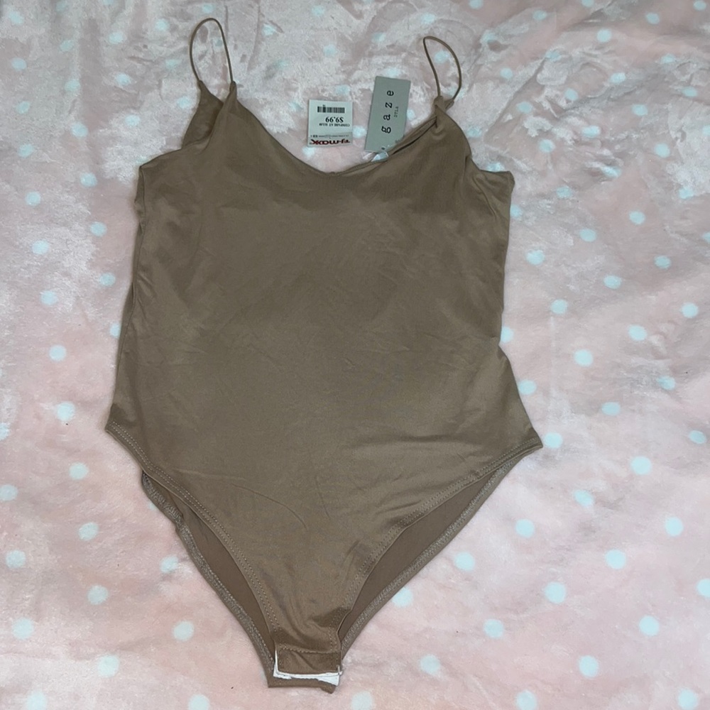 Tan body suit